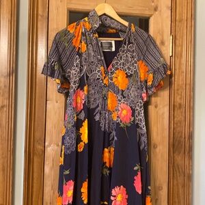 Beautiful Anthropologie dress! Generous fit! Easy to wear. Only worn once!!